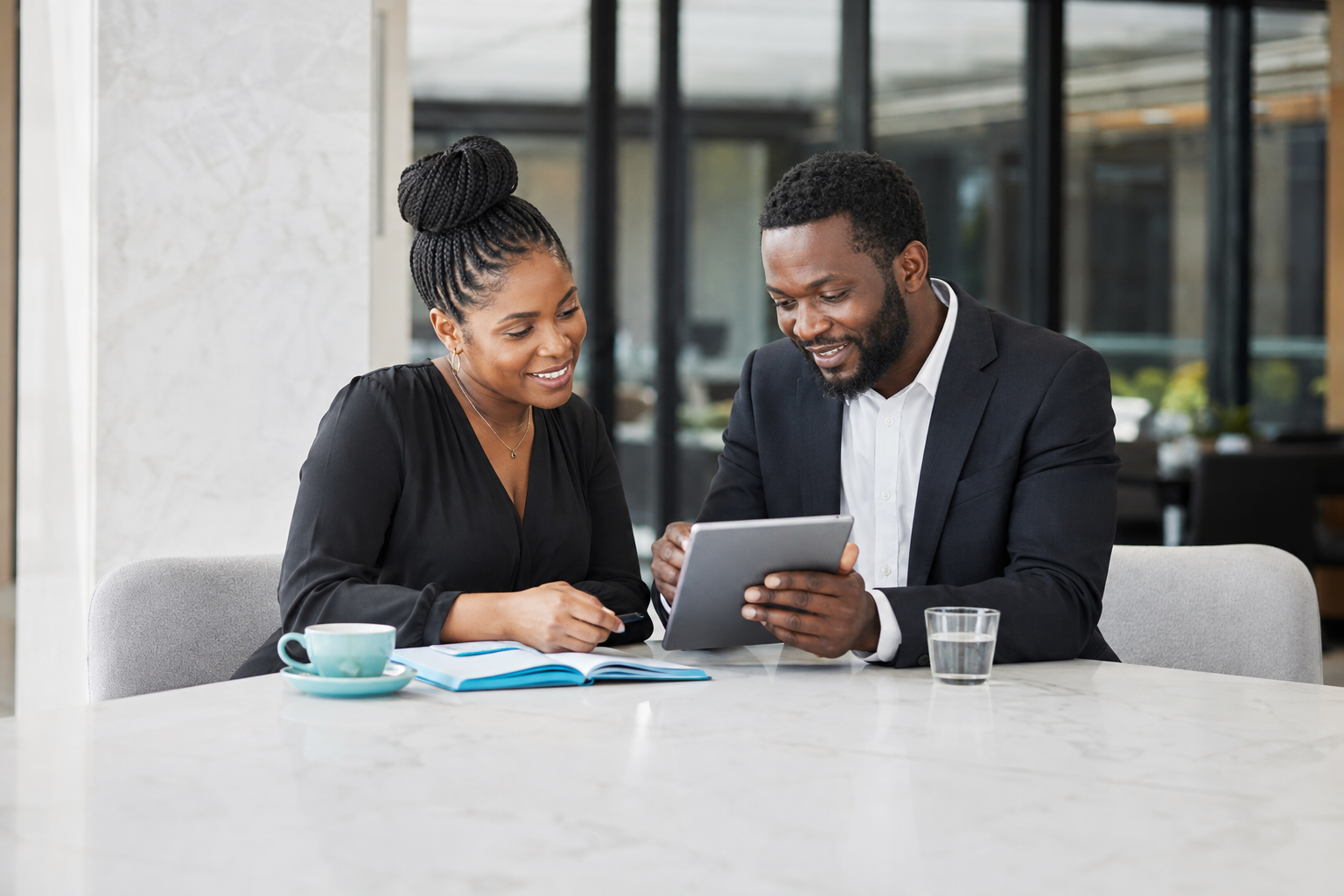 A business owner and consultant having a positive professional conversation